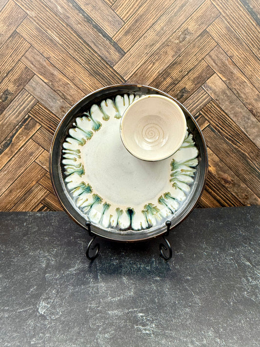 Snack plate with attached condiment bowl