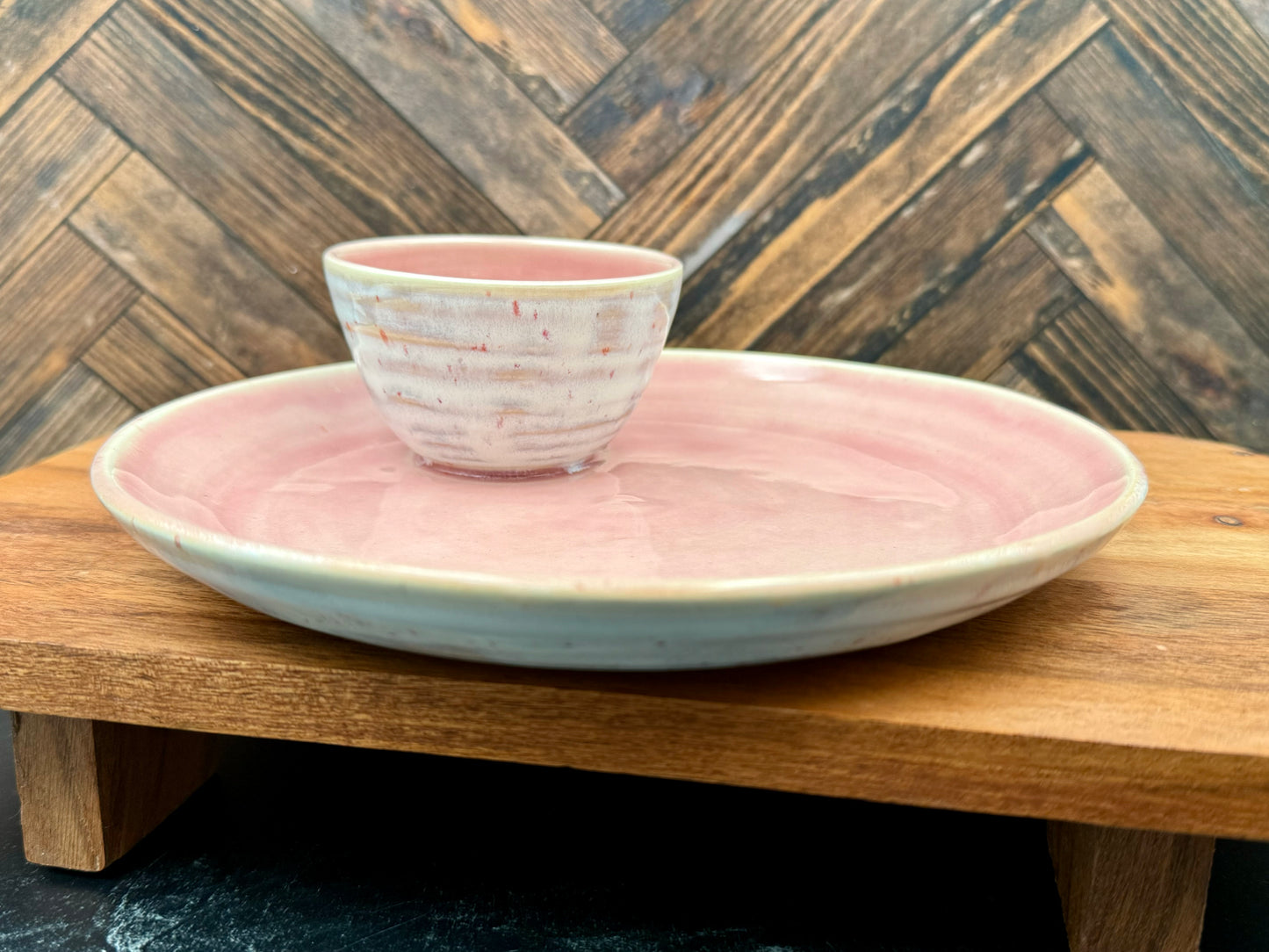Snack plate with attached condiment bowl