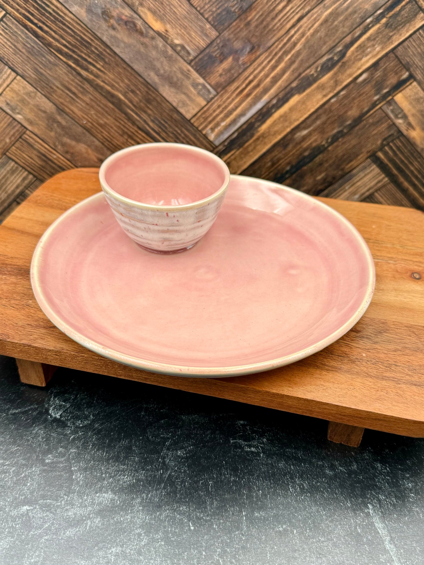 Snack plate with attached condiment bowl