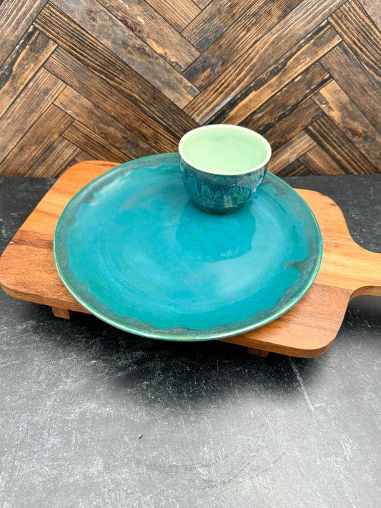 Snack plate with attached condiment bowl