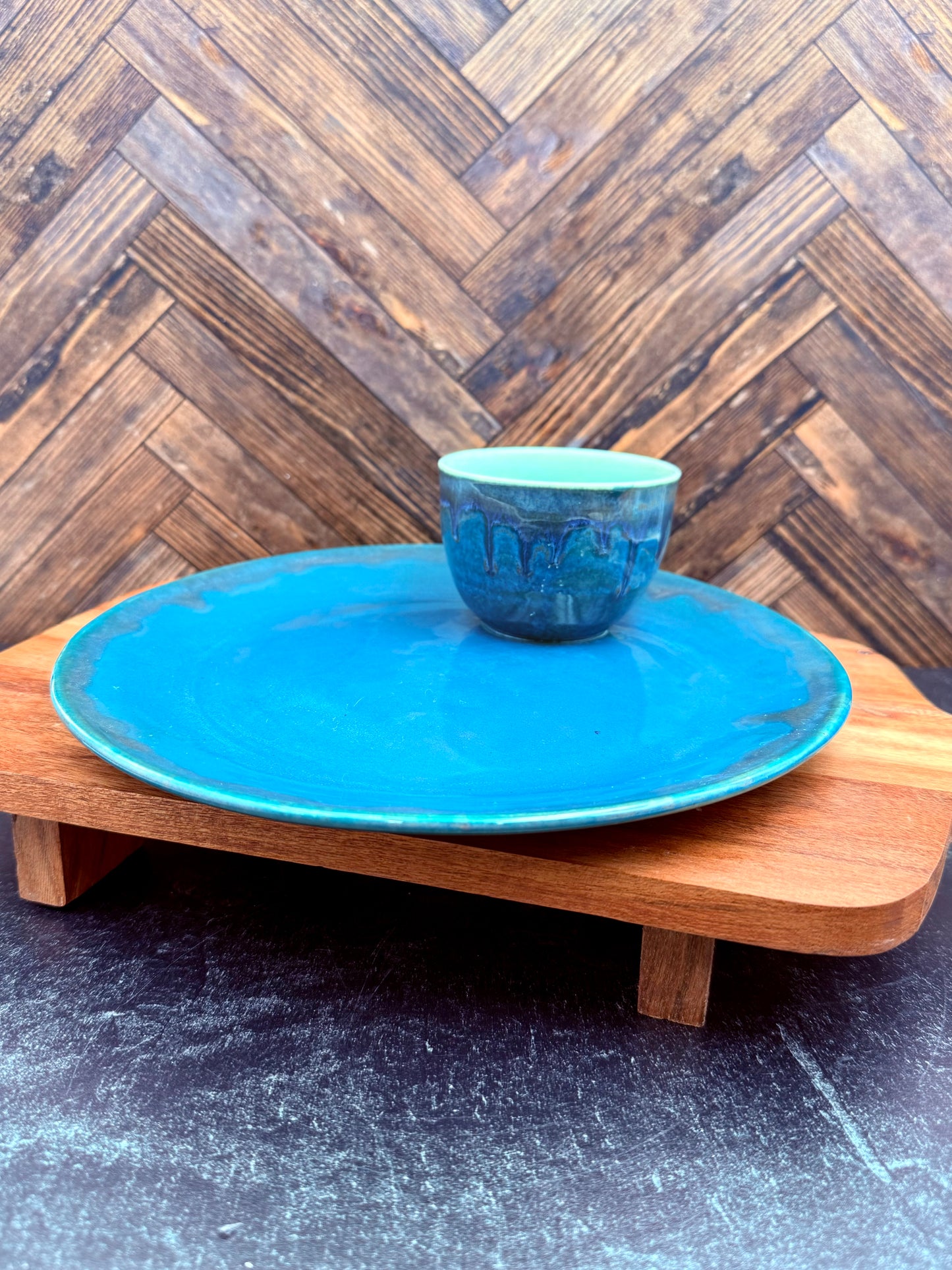 Snack plate with attached condiment bowl