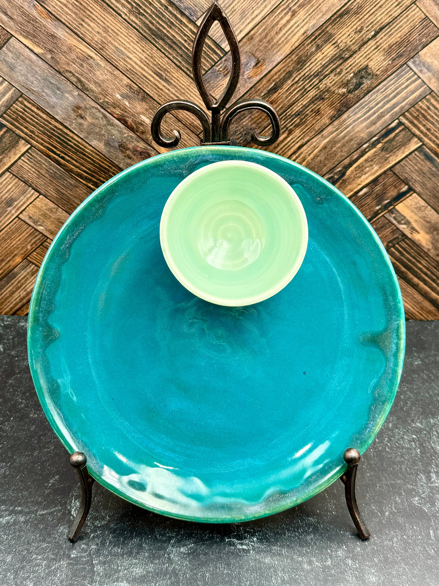 Snack plate with attached condiment bowl
